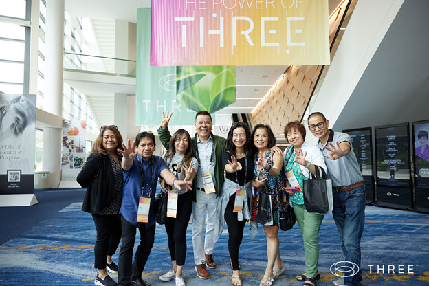 a group of happy brand ambassadors at the THREE international convention in anaheim